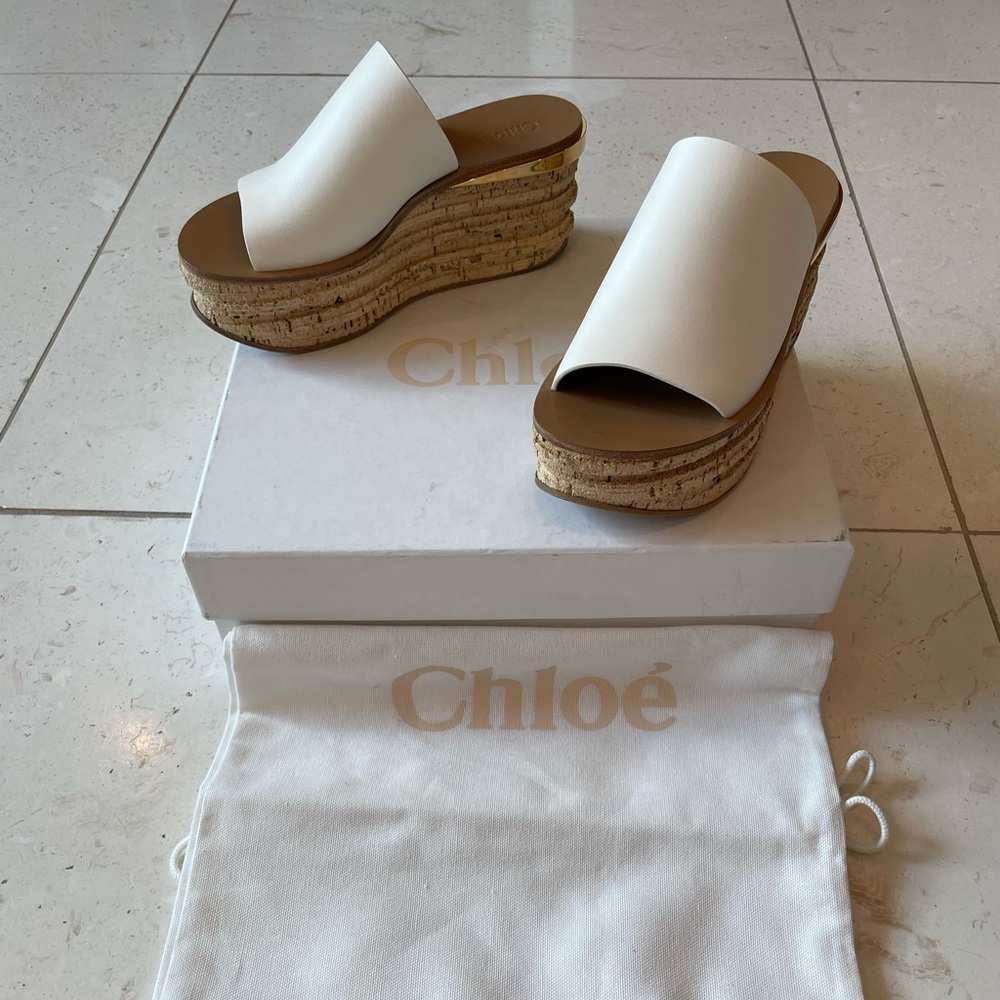 Chloe size 37 white leather wedge with gold trim at heel